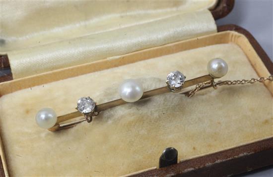 An early 20th century gold, diamond and cultured pearl set bar brooch, 1.75in.